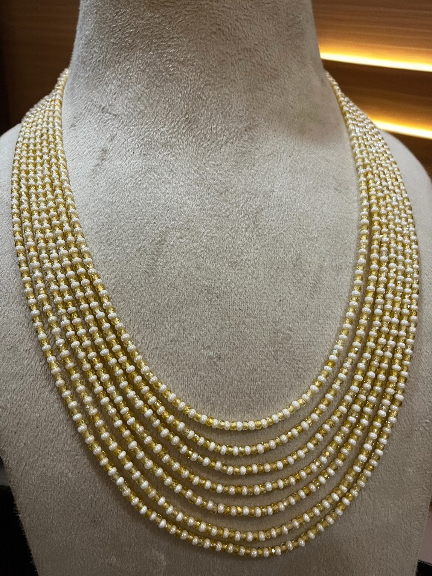 multi-strand pearl and gold bead