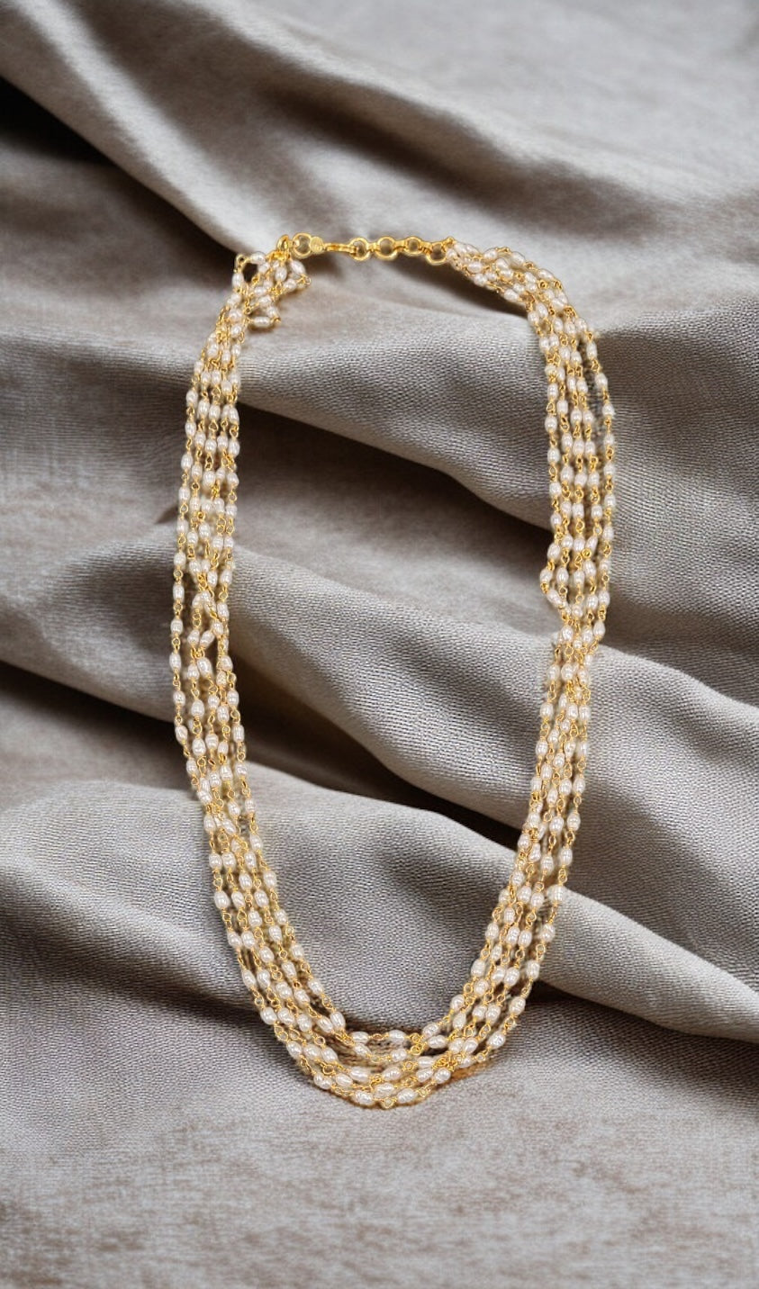 Layered silver and pearl necklace