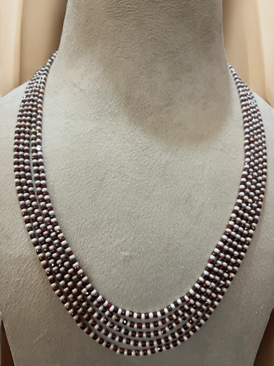 Multi-strand beaded necklace.